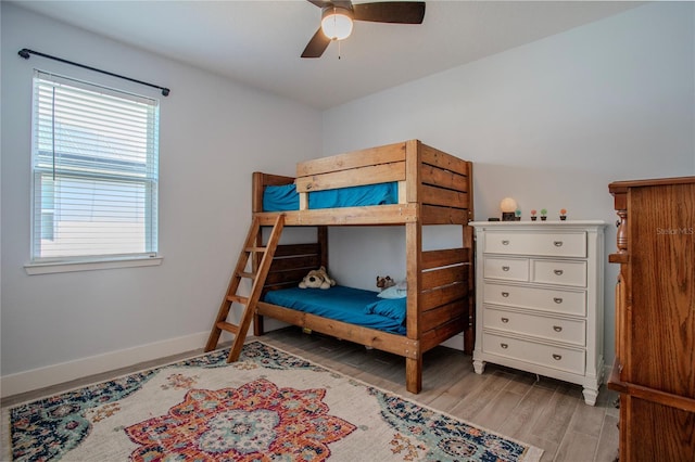 2720 Bancroft Blvd, Orlando, FL 32833 - bedroom with baseboards, a ceiling fan, and light wood-type flooring