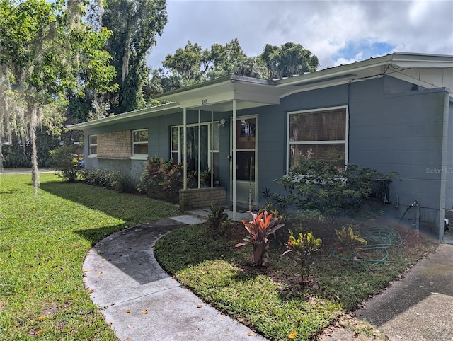 ranch-style house with a front yard