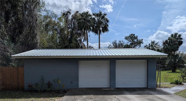 garage featuring fence