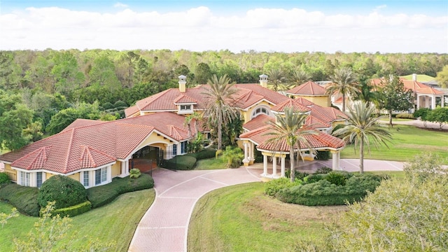 bird's eye view featuring a wooded view