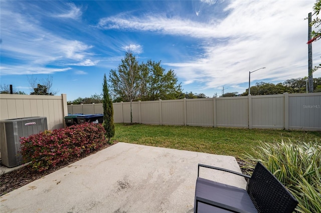 view of patio / terrace featuring cooling unit and a fenced backyard