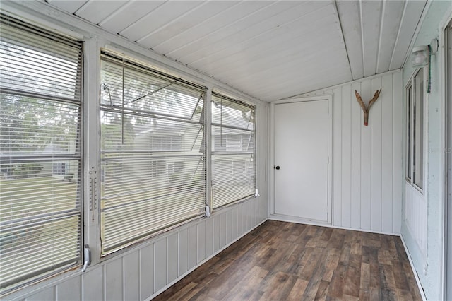 unfurnished sunroom with lofted ceiling