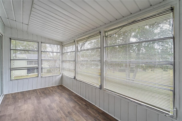 unfurnished sunroom with vaulted ceiling