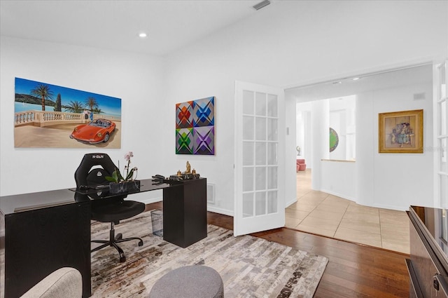 office with recessed lighting, visible vents, and hardwood / wood-style floors