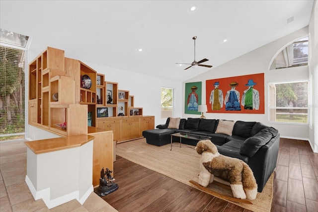 living room featuring a ceiling fan, wood finished floors, visible vents, and recessed lighting