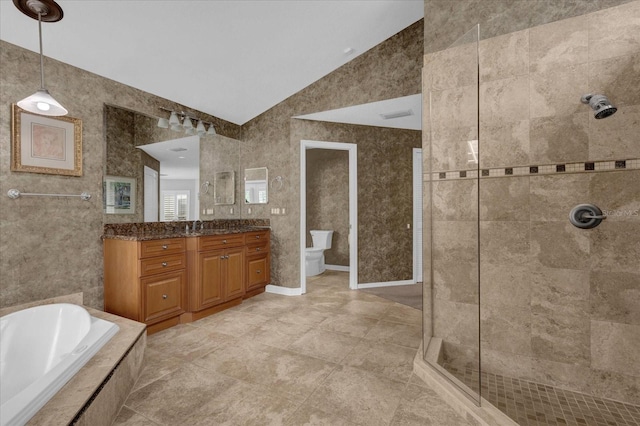 bathroom featuring tiled shower, toilet, a garden tub, vaulted ceiling, and vanity