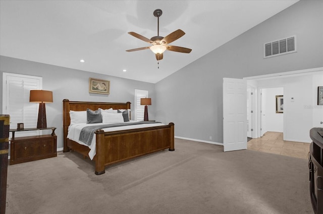 bedroom featuring high vaulted ceiling, carpet flooring, visible vents, and baseboards