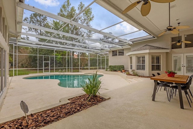 pool featuring a patio, french doors, a lanai, and a ceiling fan