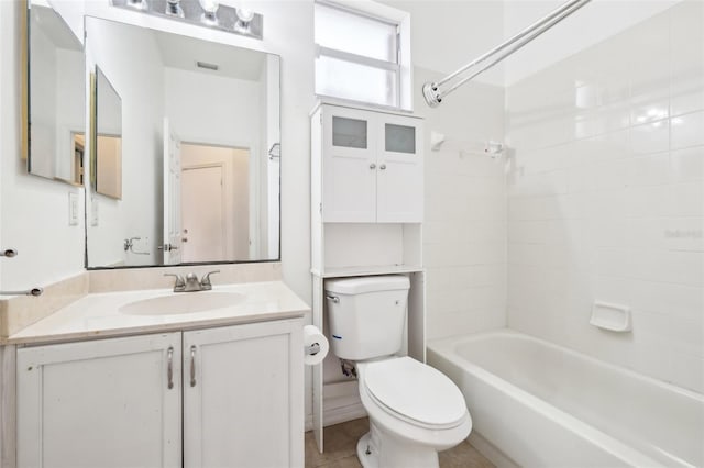 bathroom with vanity, visible vents, bathtub / shower combination, tile patterned floors, and toilet