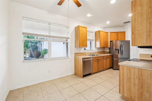 kitchen with visible vents, recessed lighting, a sink, light countertops, and appliances with stainless steel finishes