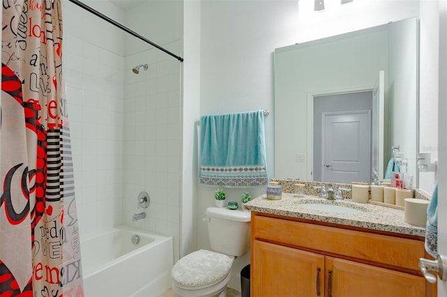 bathroom with toilet, shower / bath combo, and vanity