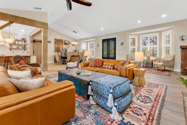 living room featuring visible vents, light wood finished floors, baseboards, recessed lighting, and vaulted ceiling