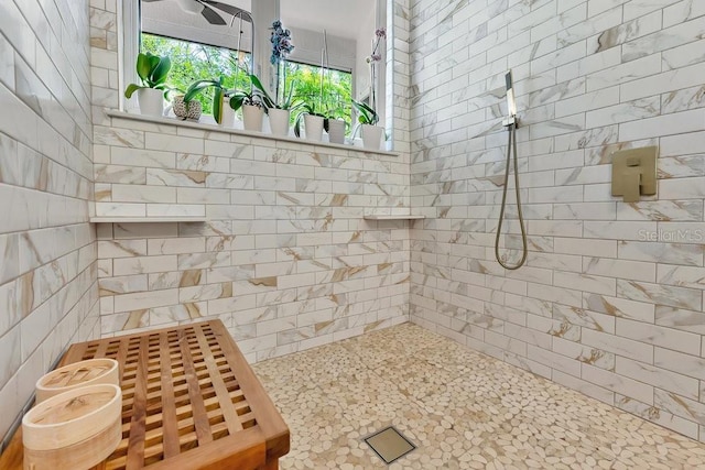 bathroom featuring tiled shower