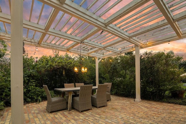 view of patio / terrace featuring a pergola and outdoor dining area