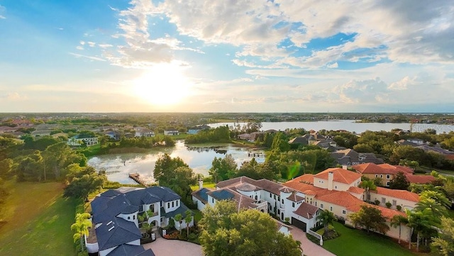 bird's eye view featuring a residential view and a water view