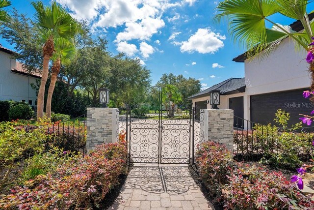 view of gate featuring fence