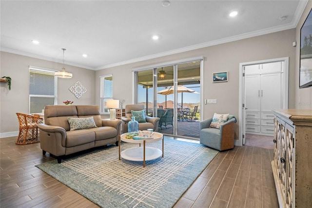 living area featuring wood finish floors, baseboards, ornamental molding, and recessed lighting