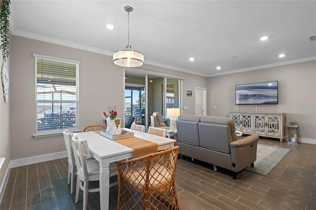 dining area featuring crown molding, recessed lighting, baseboards, and wood finish floors