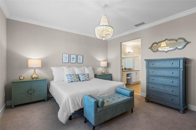 bedroom featuring visible vents, carpet, ensuite bath, and crown molding