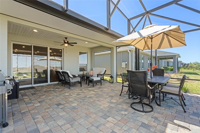 view of patio / terrace featuring an outdoor living space, glass enclosure, ceiling fan, and outdoor dining space