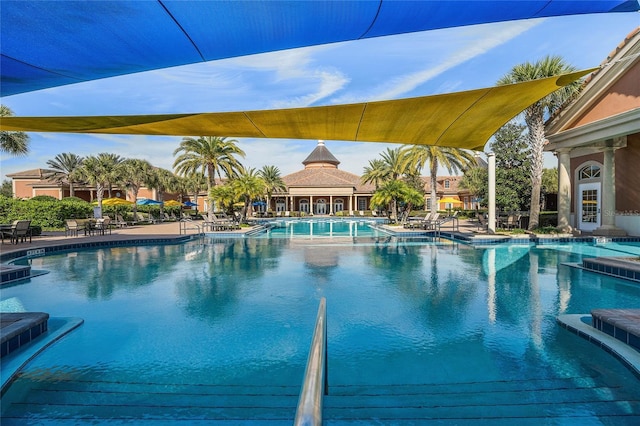 community pool with a patio