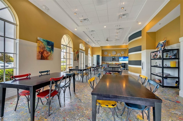 dining room featuring visible vents, recessed lighting, a high ceiling, and a paneled ceiling