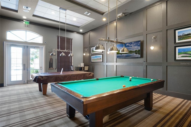 recreation room with pool table, a decorative wall, light colored carpet, and visible vents