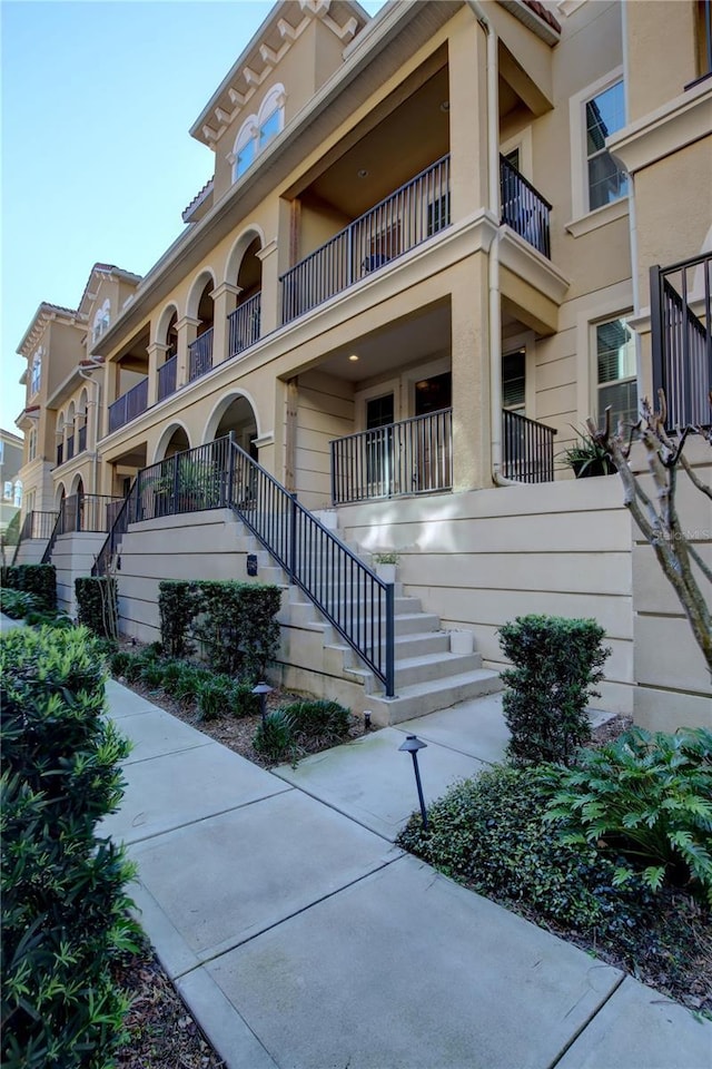 view of property with stairs