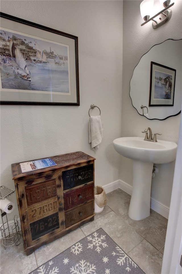 bathroom with baseboards