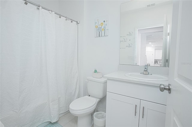 bathroom featuring visible vents, toilet, and vanity