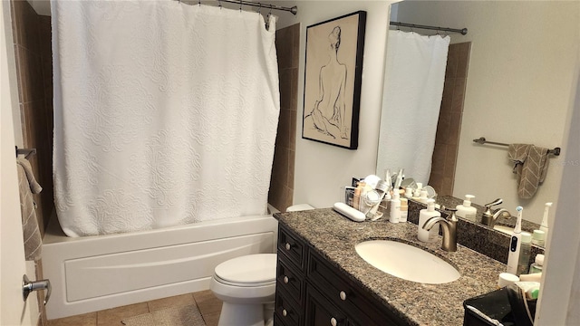 bathroom featuring tile patterned floors, vanity, toilet, and shower / tub combo