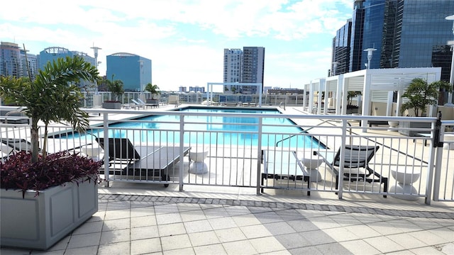 community pool featuring a view of city