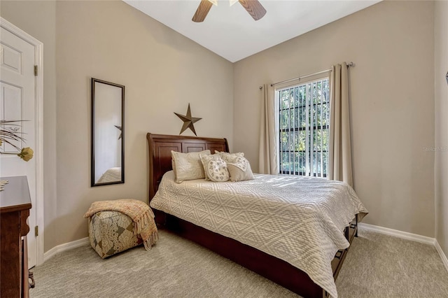 carpeted bedroom featuring ceiling fan and baseboards