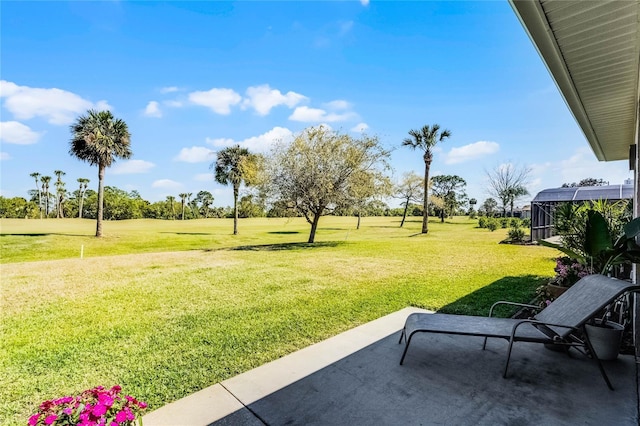 view of home's community with a yard and a patio