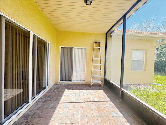 unfurnished sunroom featuring a healthy amount of sunlight