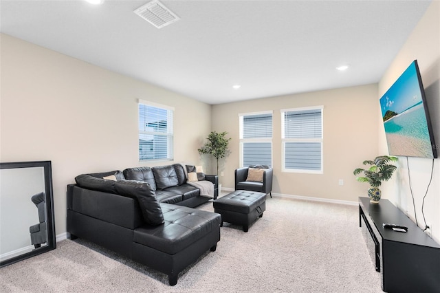 living room featuring visible vents, recessed lighting, baseboards, and carpet