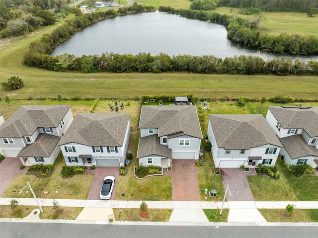 aerial view with a residential view and a water view