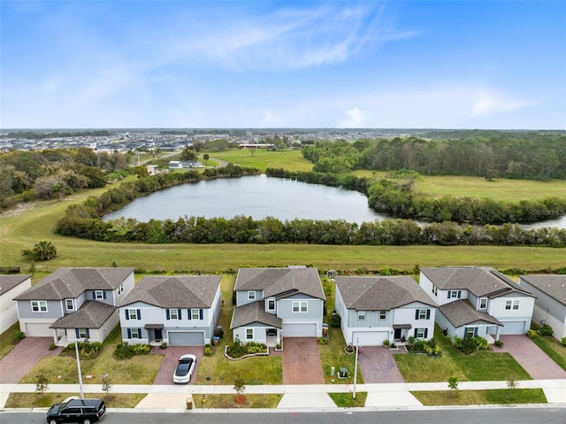 aerial view featuring a residential view and a water view