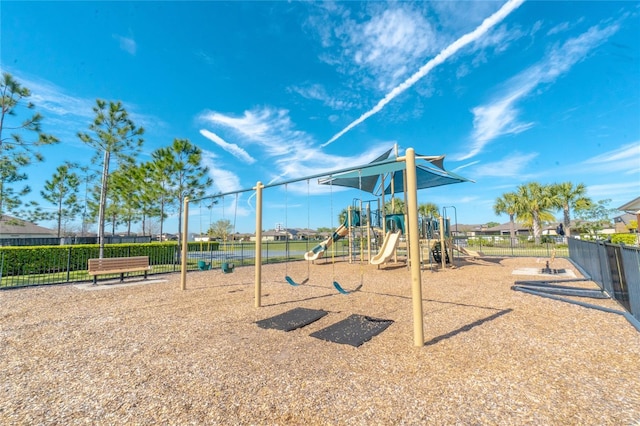 community jungle gym featuring fence