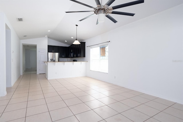 interior space with visible vents, light tile patterned flooring, recessed lighting, ceiling fan, and vaulted ceiling