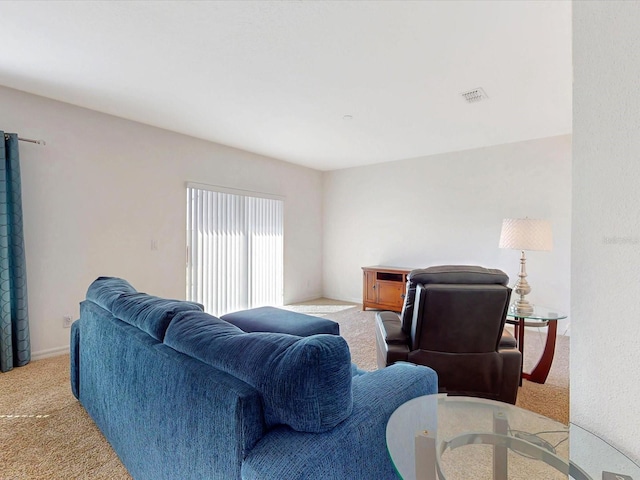 living room featuring carpet floors and visible vents