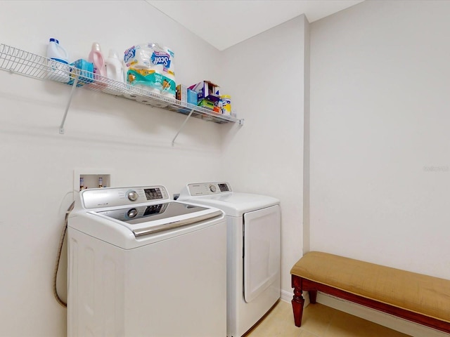 laundry room featuring laundry area and separate washer and dryer