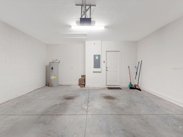 garage featuring a garage door opener, concrete block wall, electric water heater, and electric panel