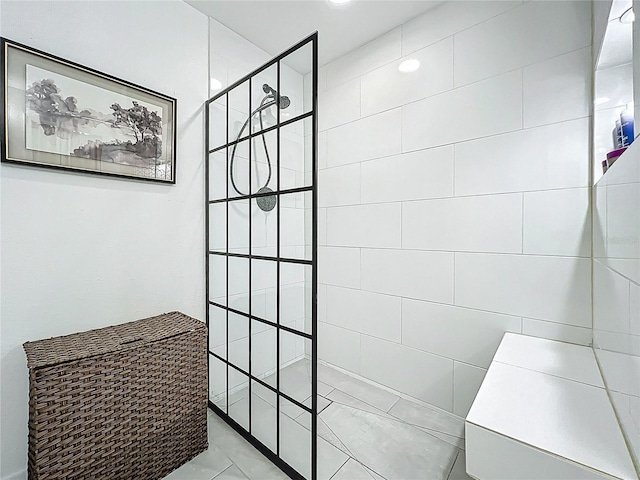 bathroom featuring walk in shower