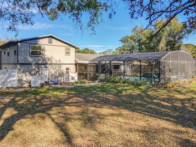 view of yard with a lanai