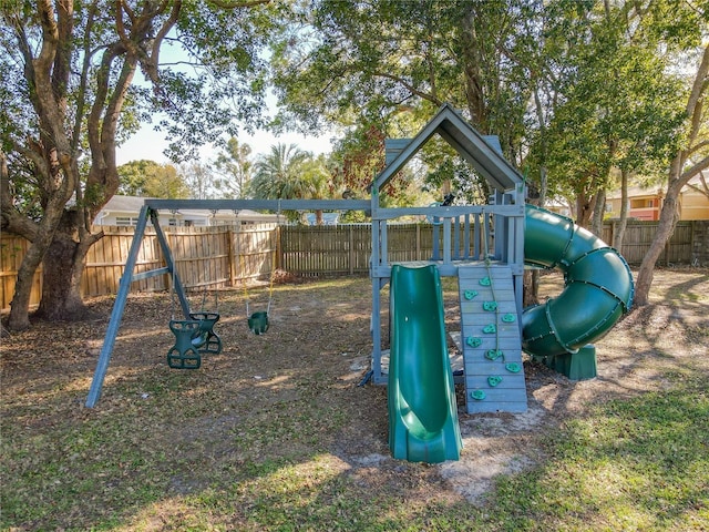 view of jungle gym featuring a fenced backyard