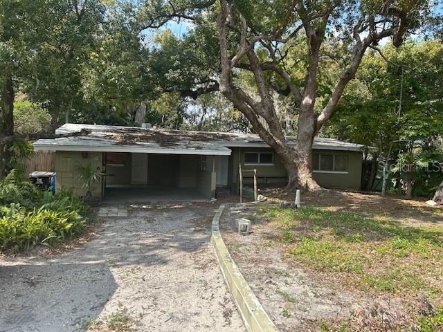 6 Barnard Ct, Maitland, FL 32751 - view of front of house featuring aphalt driveway and an attached carport
