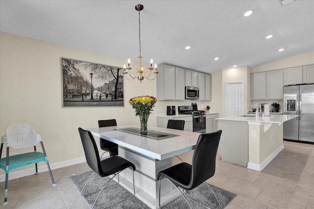 dining area featuring baseboards, lofted ceiling, recessed lighting, an inviting chandelier, and light tile patterned flooring