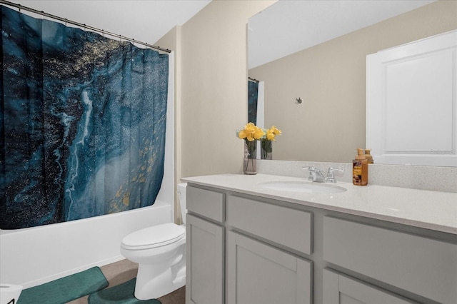 full bathroom featuring vanity, shower / tub combo, and toilet