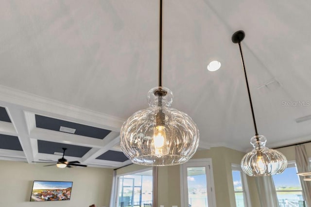 interior details featuring beam ceiling, ceiling fan with notable chandelier, and coffered ceiling